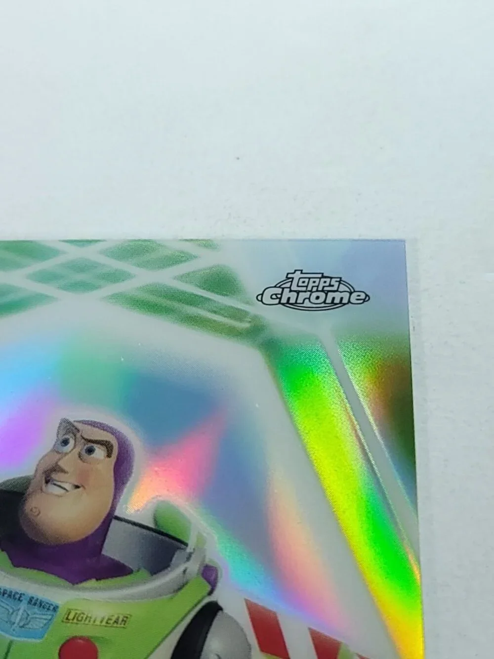 Buzz Lightyear Topps 2026 Disney Neon Holo Chrome Refractor Limited 043/199 CNE